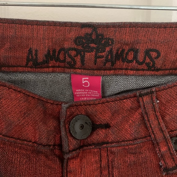 Almost Famous Metallic Red Skinny Jeans with Black Stitching Size 5 - Picture 3 of 6